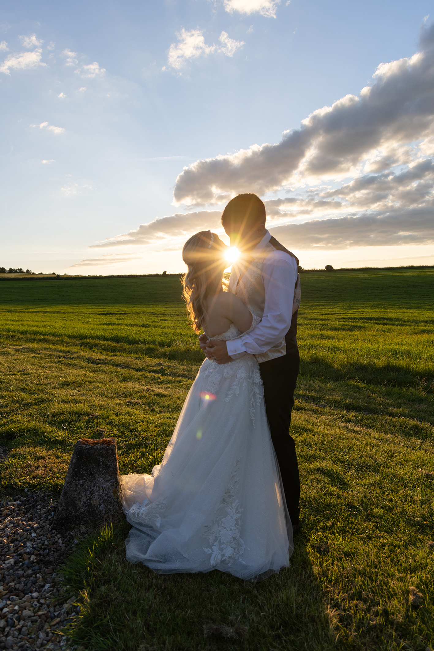 Sunset shot of a wedding couple at Wellington Barn